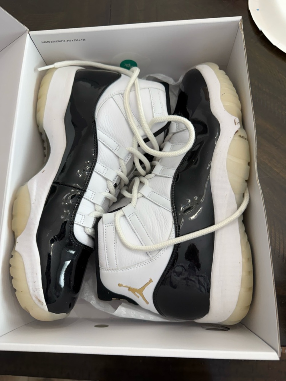 Jordan 11 Gratitude Basketball Sneakers in White, Black & Gold